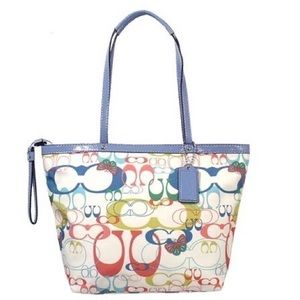 coach handbolsa with butterflies